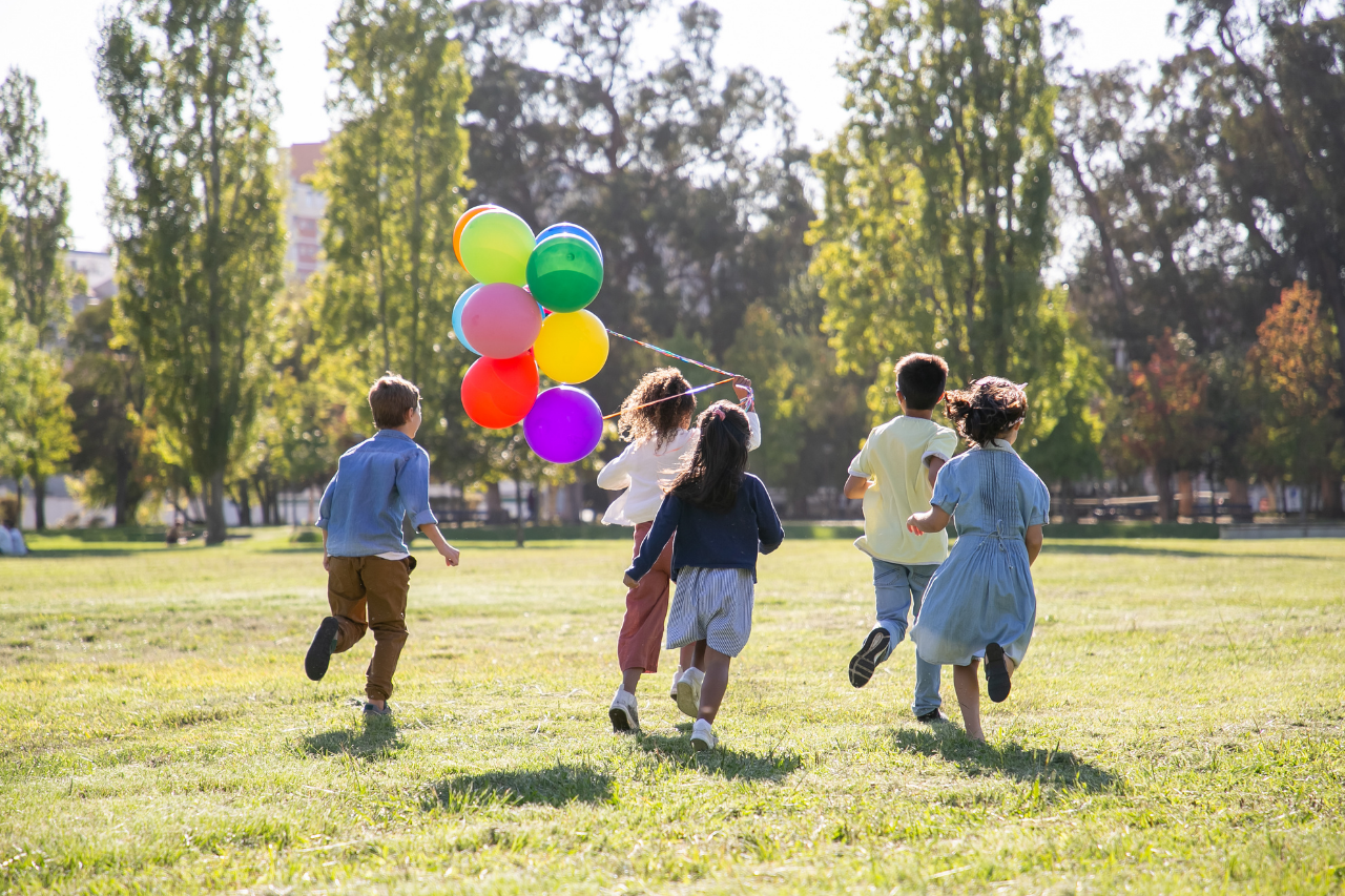 kids playing with a ballon